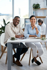 Canvas Print - All set towards great achievements. Portrait of two businesspeople working together in an office.