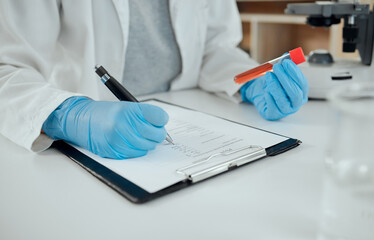 Poster - Getting closer to reaching my goal. a scientist holding a sample while making notes.