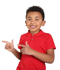 Cute African-American boy pointing on light grey background. Space for text