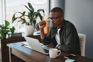 Aufkleber - Dreaming up million dollar ideas. a young businessman planning while working from home.