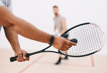 Poster - Time to show this ball whos boss. a man serving a ball with a racket during a game of squash.