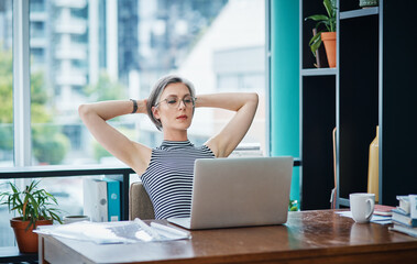 Sticker - I use online tools that help me to keep things controlled. a businesswoman looking laid back while sitting at her desk.