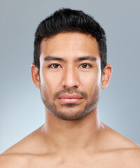 Poster - How much do you care about your appearance. Closeup shot of a handsome young man posing against a grey background.