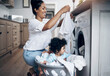 © A. Frank/peopleimages.com - She loves clean laundry. a young mother playfully bonding with her baby girl while doing the laundry at home.