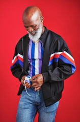Poster - Let me clear my vision. a mature man using his t-shirt to clean his glasses.