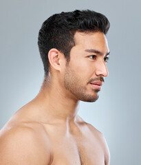 Poster - Well groomed and clean. a handsome young man posing against a grey background.