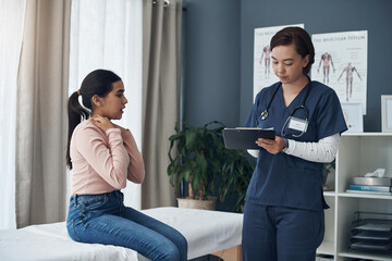 Poster - Committed to keeping you healthy. a young female doctor writing down a patients information in an office.