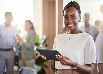 Poster - Im the owner of the most successful brand. a young businesswoman using her digital tablet.