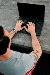 Aufkleber - Take advantage of all the awesome tools online. High angle shot of a young businessman working on his laptop.