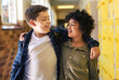 © Nicholas Felix/peopleimages.com - Were best friends. two young boys standing in the hallway at school with their arms around each other.