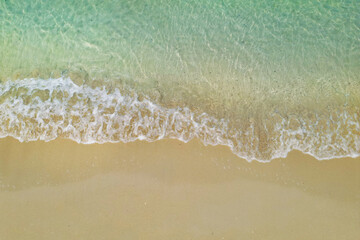 Poster - aerial view with drone ,of waves on tropical white sand beach 