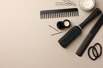 Wall Mural - Brush, combs and different hair products on light grey background, flat lay. Space for text
