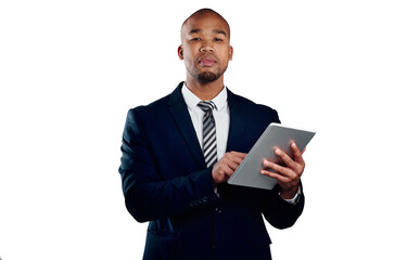 Canvas Print - Touching his way to corporate success. Studio shot of a handsome young businessman using a tablet against a white background.