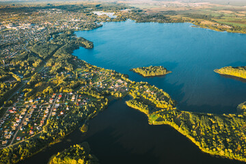 Wall Mural - Lyepyel, Lepel Lake, Beloozerny District, Vitebsk Region. Aerial View Of Lyepyel Cityscape Skyline In Autumn Morning. Morning Fog Above Lepel Lake. Top View Of European Nature From High Attitude In
