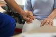 © Prathankarnpap - Cropped shot of doctor holding hand, comforting upset senior patient. Elderly healthcare concept