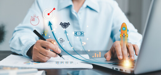 Startup concept with icon business and network connection on modern virtual interface from laptop computer. People hand touching on tablet.Developing and improving organization with modern technology