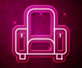 Wall Mural - Glowing neon line Cinema chair icon isolated on red background. Vector