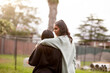 © Austockphoto - Two young Aboriginal women walking together