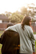 © Austockphoto - Two Aboriginal besties walking together with arm over shoulder