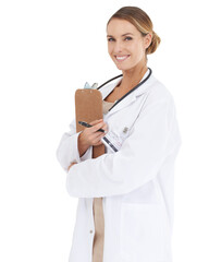 Wall Mural - Ready for her next appointment. An attractive female doctor holding a clipboard - isolated.