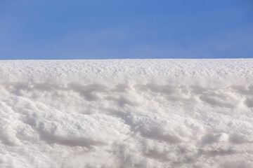 Wall Mural - white snow in daylight, background, isolate on black background