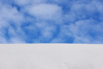 Wall Mural - white snow in daylight, background, isolate on black background
