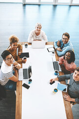 Aufkleber - The secret is to stay on the same page. a group of young businesspeople having a meeting in a modern office.