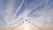 Unbranded Military Fighter Jets Flying Overhead In A V-shaped Formation At Sunrise - Seamless Looping.