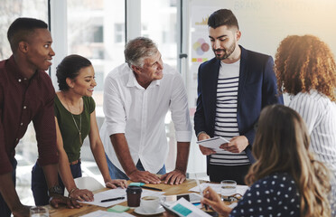 Aufkleber - Do not put limitations on your ability to create. creative employees working in a modern office.