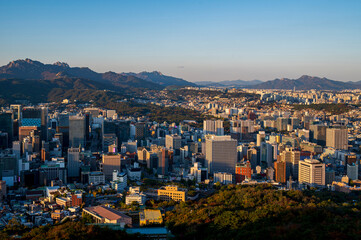 Wall Mural - sunset of Seoul cityscapes with high rise office buildings and skyscrapers in Seoul city, Republic of Korea in winter blue sky and cloud