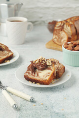 Wall Mural - A piece of marble biscuit with chocolate cream and nuts