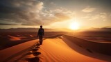 Fototapeta Zachód słońca - Hiker man walking in the desert sand dunes at sunset - Happy traveler with arms up enjoying freedom outside - Wanderlust, wellbeing, happiness and travel concept.
