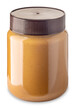 Peanut butter in glass jar isolated