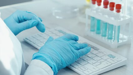 Poster - Scientist in medical laboratory analyzes medical data and contributes to development science. Doctor types data on keyboard. Computer experiments in laboratory using biotechnology, chemical reactions