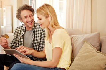 Sticker - What should we buy. a loving couple shopping online on their tablet.