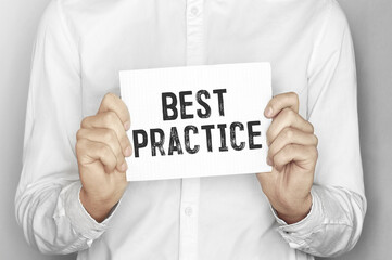 Aufkleber - Man holding a paper card with text Best Practice