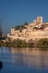 Wall Mural - Beautiful panoramic view of Zamora cityscape during Autumn season, from the other side of the Douro River, in Spain.