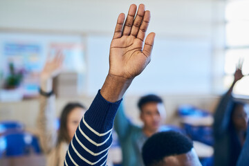 Poster - He knows all the answers. an unrecognizable varsity student raising his hand in class.