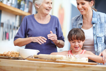 Sticker - They all love baking. a three generational family baking together.