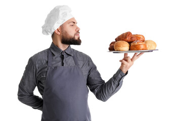 Canvas Print - Male baker holding tray with pastries on white background