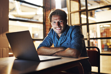 Aufkleber - Im on top of all of my targets. Cropped portrait of a handsome young male designer looking pleased while working late in his office.