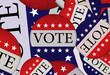 © khan-art - presidential or midterm election campaign. vote badges 3d illustration.
