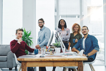Aufkleber - You wont find a more hardworking team. Portrait of a team of young go getters working in a modern office.