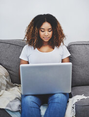 Aufkleber - What the weekend is all about. an attractive young woman using a laptop at home.