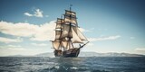 a large sailing ship in the middle of the ocean