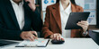 © NINENII - Businessmen team or financial data analysts working with tablets and laptop computers and data graphs together. Plan to analyzing projects in the office.