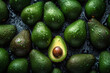 Fresh Green Avocados with Droplets of Water, Top-View Close-Up Background