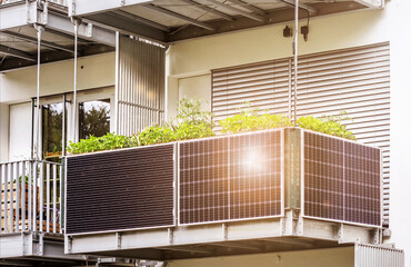 Wall Mural - Solar Panel in Modern Balcony of Apartment Building with Sun light Reflection. Solar Energy of  Apartments Flat. Eco Apartment in Eco City.