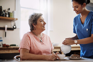 Aufkleber - Time for some afternoon tea. an attractive young female caregiver pouring a cup of tea for a senior patient in a nursing home.