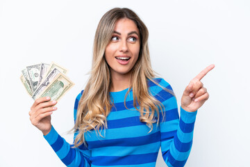 Canvas Print - Young Uruguayan woman taking a lot of money isolated on white background intending to realizes the solution while lifting a finger up